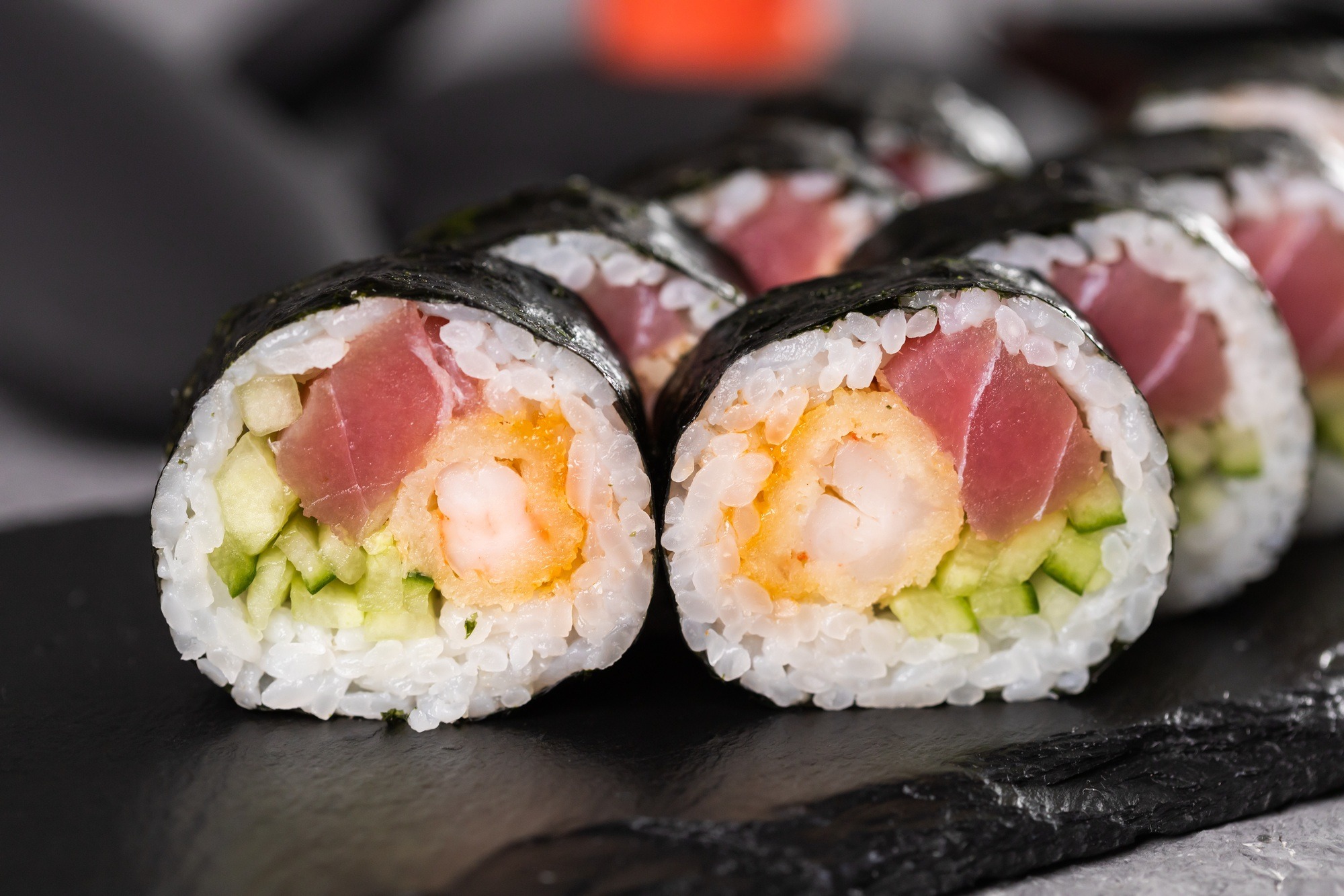 Sushi roll on dark background. Japanese and asian food concept